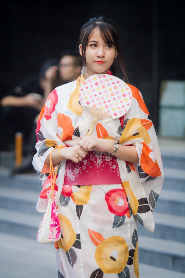 A young Japanese girl wearing a colorful kimono