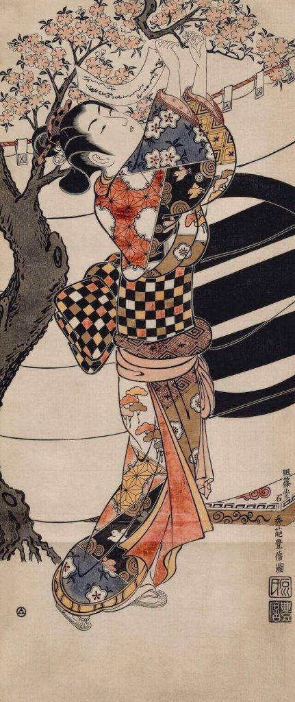 Woodblock print of a woman wearing a colorful kimono