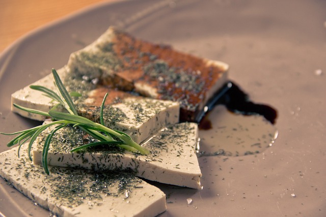 Slices of tofu on a ceramic dish