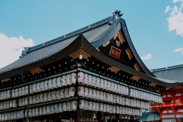 Japanese lanterns adorning the exteriors of the Yasaka Shrine