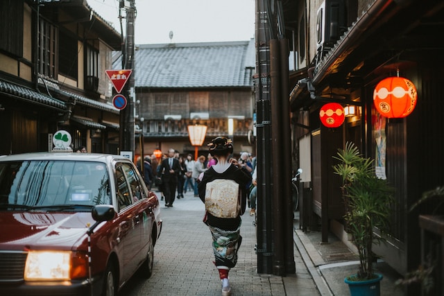 A geiko walking down the street